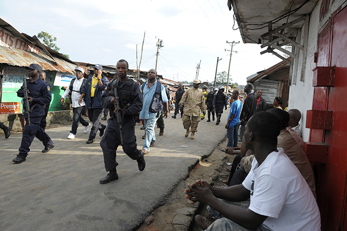 Liberian security forces patrol a street after clashes at West Point neighbourhood in Monrovia August 20, 2014 (Reuters / 2Tango)