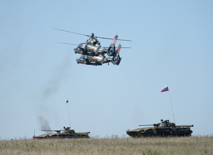 ARCHIVE PHOTO: Chinese Z9B helicopters and Russian BMP-2 vehicles during practical training held as part of the Peace Mission 2013, a Russia-China joint anti-terrorism drill, at the Chebarkul firing range. (RIA Novosti / Pavel Lisitsyn)