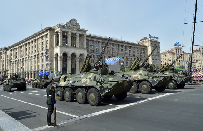 Ukrainian forces parade during a military ceremony marking the 23rd anniversary of Ukraine's independence in the center of Kiev on August 24, 2014. (AFP Photo / Sergei Supinsky)