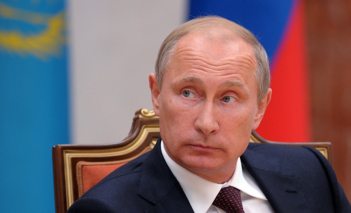A handout picture released on August 26, 2014 by the Russian President press office shows Russian President Vladimir Putin as he takes part in a meeting in Minsk on August 26, 2014 (AFP Photo / Alexey Druzhinin)