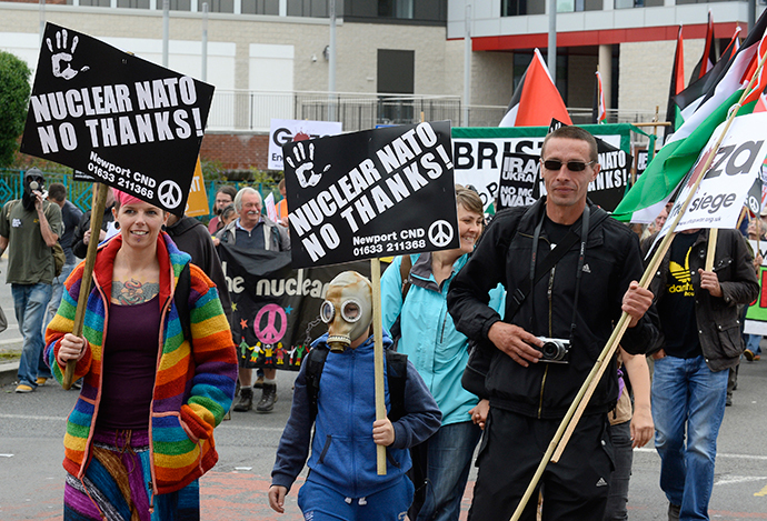 Demonstrators take part in an anti-war protest march in Newport, Wales, August 30, 2014. (Reuters / Rebecca Naden)