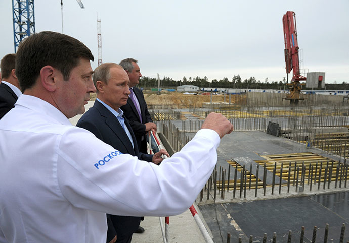 September 2, 2014. President Vladimir Putin, second left, Head of the Russian Space Agency Oleg Ostapenko, left, and Deputy Prime Minister Dmitry Rogozin during a visit to the Vostochny Cosmodrome. (RIA Novosti / Alexei Druzhinin)
