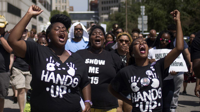 Police chief's attempt to join Michael Brown march provokes new arrests, tensions in Ferguson