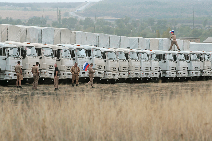 A Russian convoy of trucks carrying humanitarian aid for Ukraine is parked at a camp near Kamensk-Shakhtinsky, Rostov Region, September 12, 2014 (Reuters / Alexey Koverznev)