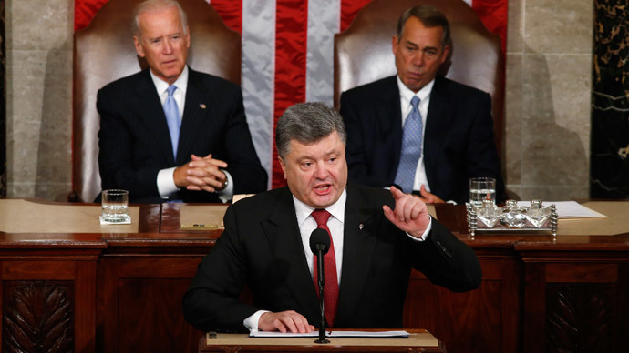 Ukraine President Petro Poroshenko (C) gestures while addressing a joint meeting of Congress in the U.S. Capitol in Washington, September 18, 2014. (Reuters / Kevin Lamarque) 