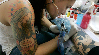 The girl with the hazard tattoo:  Duma scrutinizes ‘tramp stamp’ dangers