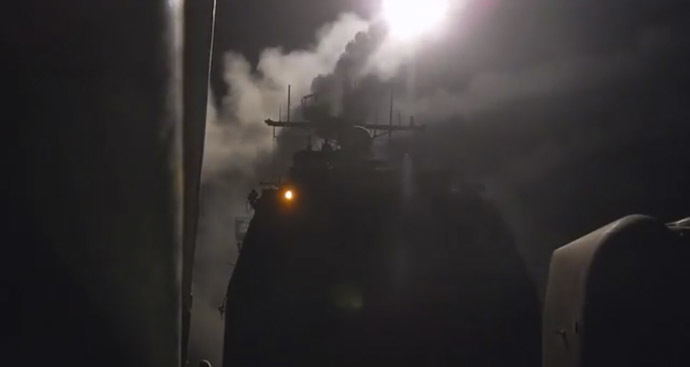 A still image captured from U.S. Navy video footage shows a Tomahawk Land-Attack Missile (TLAM) is launched against ISIL targets from the guided-missile cruiser USS Philippine Sea in the Gulf, September 23, 2014. (Reuters/Abe McNatt/U.S. Navy/Handout)