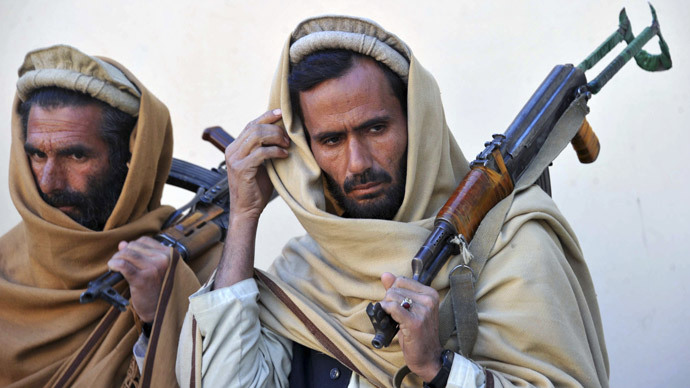 Taliban storms Afghan region, kills 100 in days, amid incomplete power handover