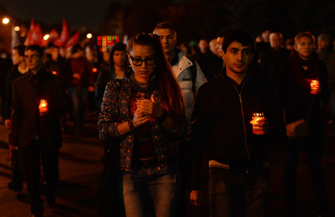 Participants of a memorial rally "Donetsk: Innocent victims" held on Moscow's Poklonnaya Gora. (RIA Novosti/Mikhail Voskresenskiy)
