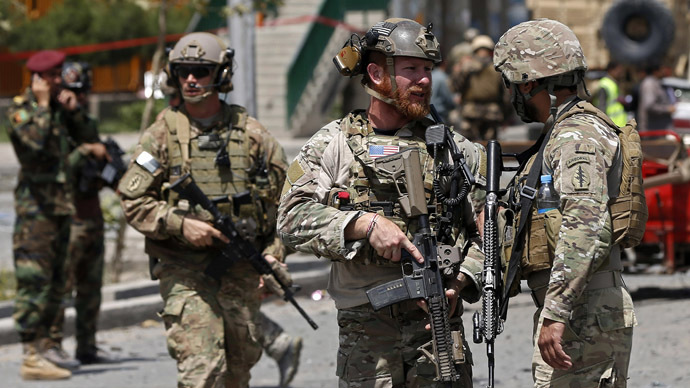 Afghan, US officials sign long-awaited pact to ensure troops stay past 2014