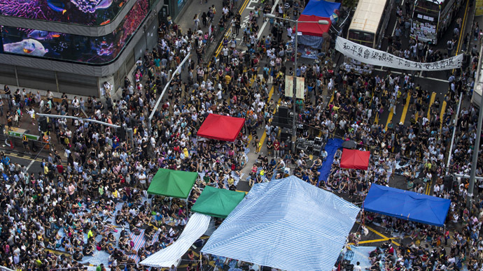 Hong Kong protesters threaten to occupy buildings if city chief doesn’t quit