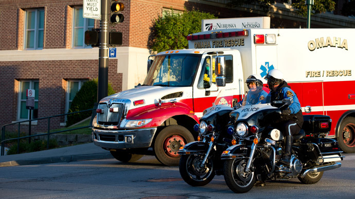 An ambulance transports Ashoka Mukpo, a freelance cameraman who contracted Ebola in Liberia, to the Nebraska Medical Center in Omaha, Nebraska, October 6, 2014.(Reuters / Sait Serkhan Gurbuz)