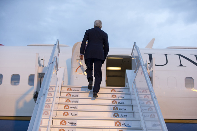 U.S. Secretary of State John Kerry board his plane at Orly Airport. (Reuters/Carolyn Kaster)