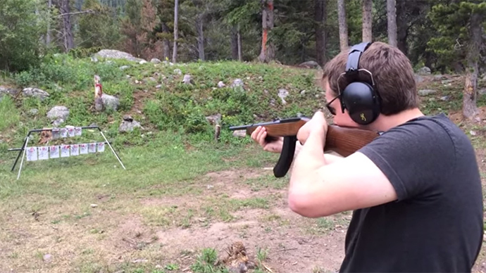 Anthem to arms: Man performs Star-Spangled Banner with gun