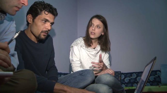 Bazran Halil, a Kurdish rights activist and journalist, and his wife Raushan. Still from RT video
