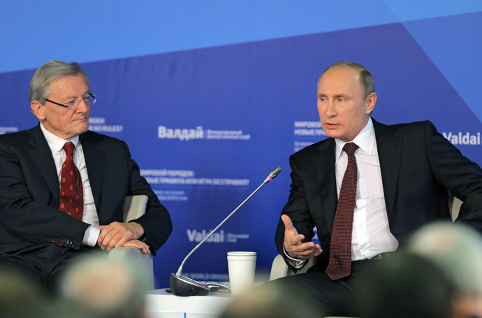 Russian President Vladimir Putin (R) and former Chancellor of Austria Wolfgang Schussel during the final plenary meeting of the 11th session of the Valdai International Discussion Club in Sochi October 24, 2014. (RIA Novosti / Vitaliy Belousov)