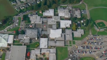 Washington school shooter fired at family, killed classmate