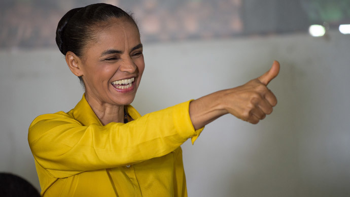 Brazilian Marina Silva(C) presidential candidate.(AFP Photo / YasuyoshI Chiba)