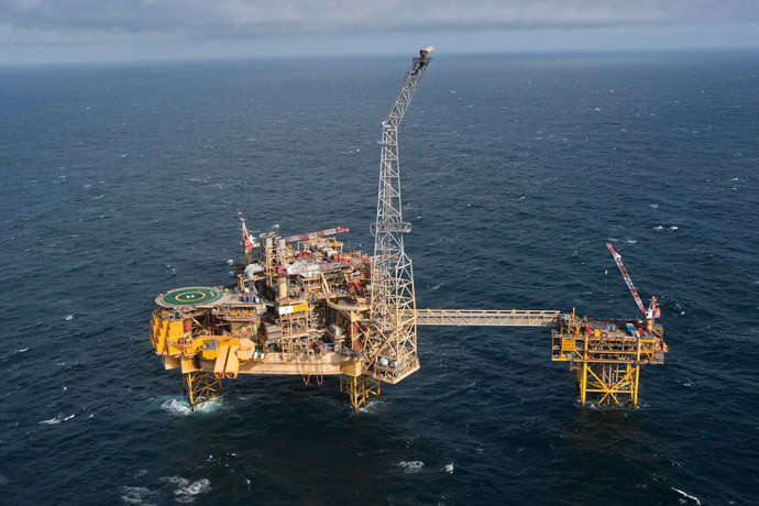 Total's Elgin PUQ platform (L) and the wellhead platform (R) in the North Sea, 150 miles (241 kilometres) off the coast of Aberdeen in eastern Scotland. (AFP Photo / Total E&P UK)