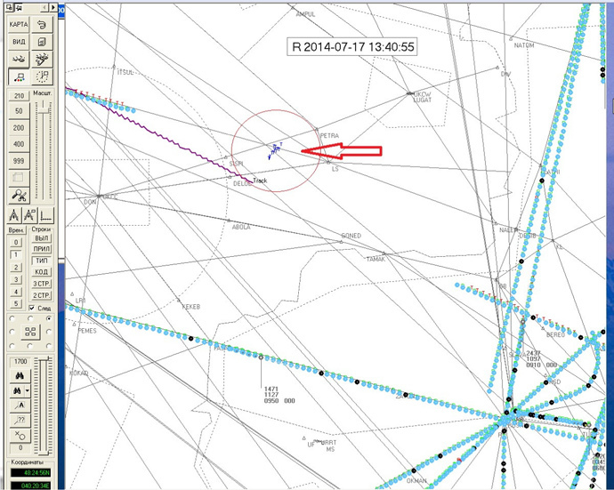 The alleged military plane or planes are represented by blue spots tagged 'T,' while MH17âs route is marked by a purple line. (image from www.aviasafety.ru)