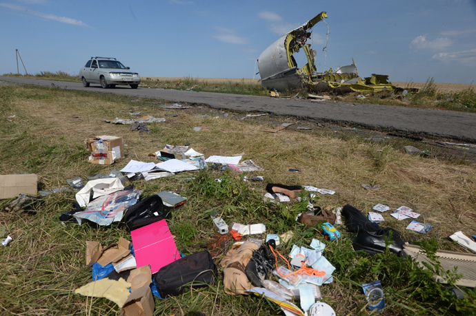 At the crush site of the Malaysian Airlines Boeing 777, outside the village of Grabovo, near Shakhtyorsk, Donetsk Region. (RIA Novosti / Mikhail Voskresenskiy)