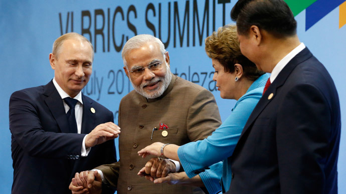 (L-R) Russia's President Vladimir Putin, India's Prime Minister Narendra Modi, Brazil's President Dilma Rousseff and China's President Xi Jinping pose for a group picture during the VI BRICS Summit in Fortaleza July 15, 2014.(Reuters / Paulo Whitaker)