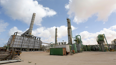 Oil slumps into tailspin as OPEC leaves output unchanged