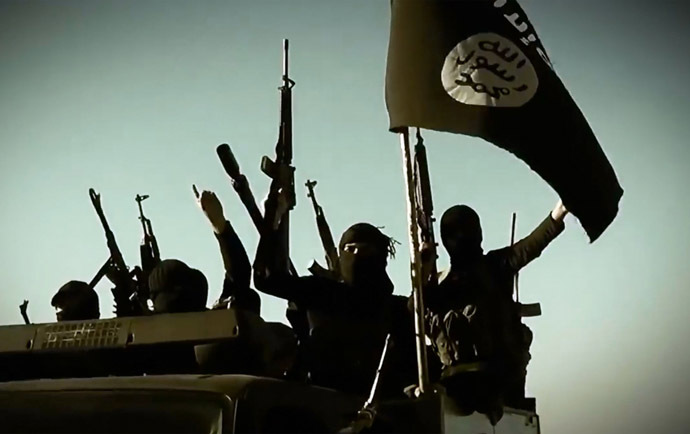 An image grab taken from a propaganda video released on March 17, 2014 by the Islamic State of Iraq and the Levant (ISIL)'s al-Furqan Media allegedly shows ISIL fighters at an undisclosed location in the Anbar province.(AFP Photo/HO/Al-Furquan Media)