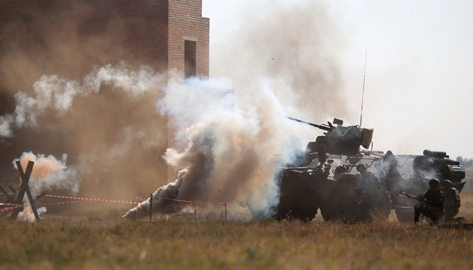 Russian military vehicles during the joint anti-terrorist Russian-Indian drills, Indra-2014, at the Prudboy range in the Volgograd Region. (RIA Novosti / Kirill Braga)