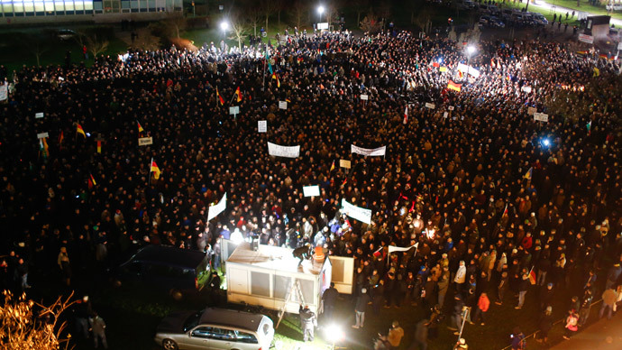 Participants attend a demonstration called by anti-immigration group PEGIDA, a German abbreviation for "Patriotic Europeans against the Islamization of the West", in Dresden December 8, 2014. (Reuters / Hannibal Hanschke)
