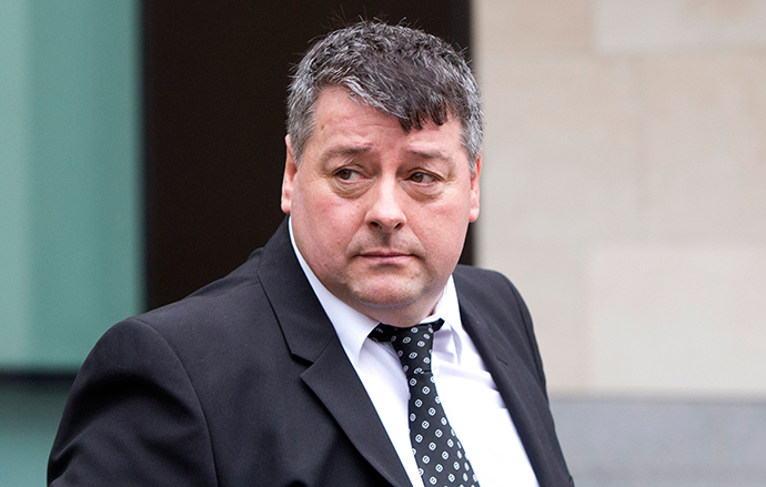 Former officer of security firm G4S Terrence Hughes leaves Westminster Magistrates Court in London.(Reuters / Neil Hall)