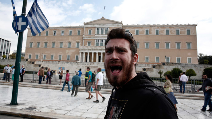 A protester from the Communist-affiliated trade union PAME shouts slogans during an anti-austerity rally in front of the parliament in Athens. (Reuters / Yorgos Karahalis)