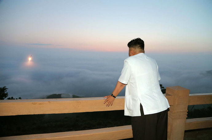 This undated picture released from North Korea's official Korean Central News Agency on June 30, 2014 shows launching of a tactical rocket during a firing drill by the Korean People's Army Strategic Force at an undisclosed place in North Korea. (AFP/KCNA)