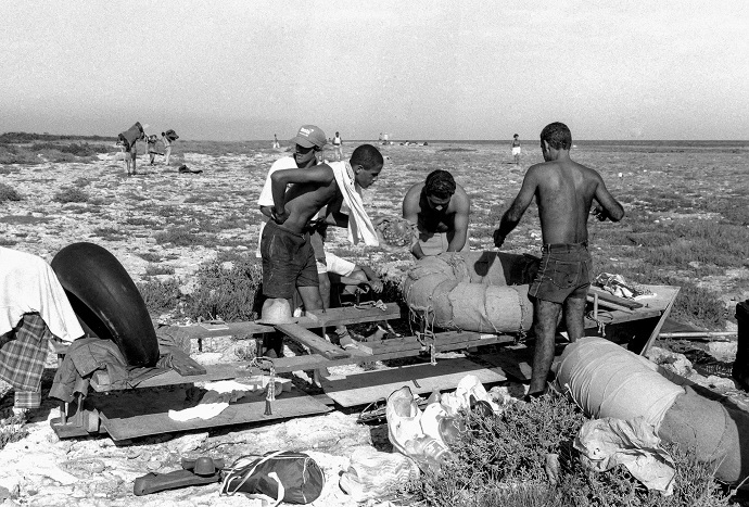 People prepare to launch a makeshift boat into the Straits of Florida towards the US, on the last day of the 1994 Cuban raft exodus in Havana (Reuters/Rolando Pujol Rodriguez)