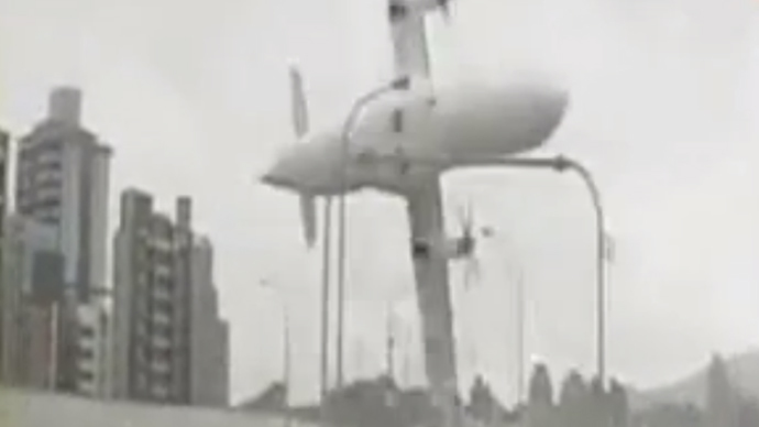 Terrifying Taiwan plane’s fatal river dive caught on camera (VIDEO)