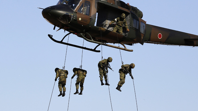 Japan set to loosen control over military introduced post WWII – report
