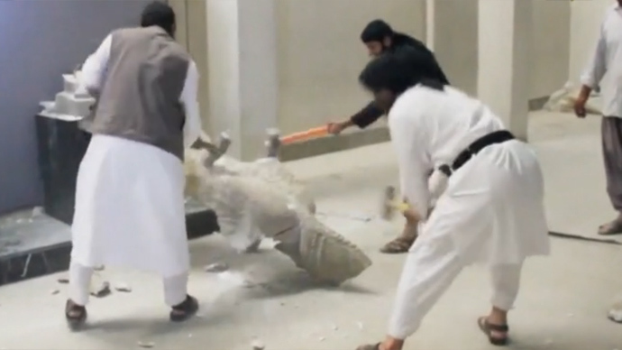 ISIS militants destroy ancient statues, relics in Iraq (VIDEO ...