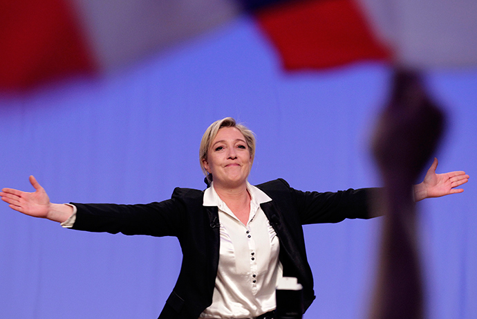 France's far right presidential candidate and National Front party president Marine Le Pen waves as she arrives to deliver a speech at a political rally in Strasbourg, February 12, 2012 (Reuters / Vincent Kessler)