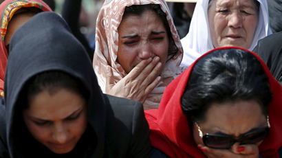Afghan women's rights activists mourn during the burial ceremony of Farkhunda, an Afghan woman who was beaten to death and set alight on fire on Thursday, in Kabul March 22, 2015. (Reuters/Mohammad Ismail)