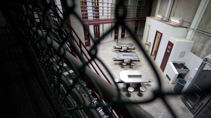 Obama to release half of Guantanamo inmates in push to close camp - reports