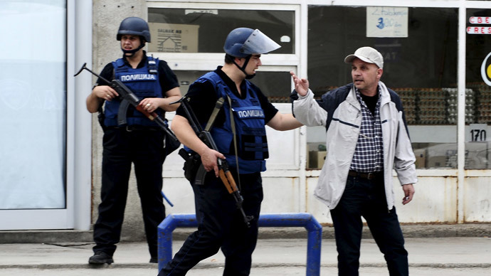 Sniper fire, explosions: 8 Macedonian police dead after clashes in Albanian district