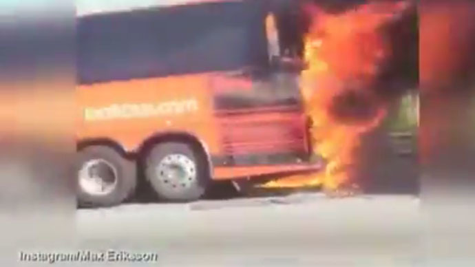 Blazing bus blows up on Massachusetts highway, meters from traffic flow (VIDEO)