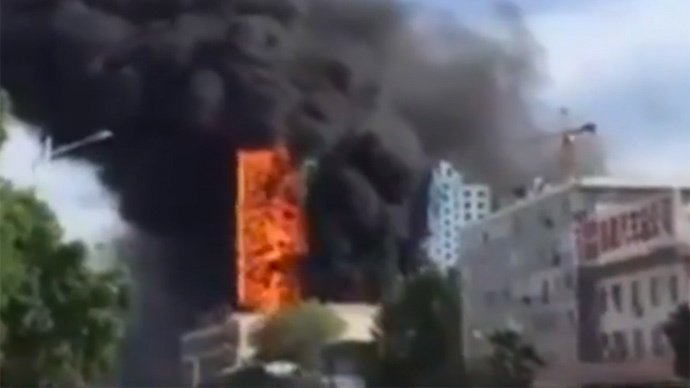 Raging blaze engulfs Chinese high-rise in seconds (VIDEO)
