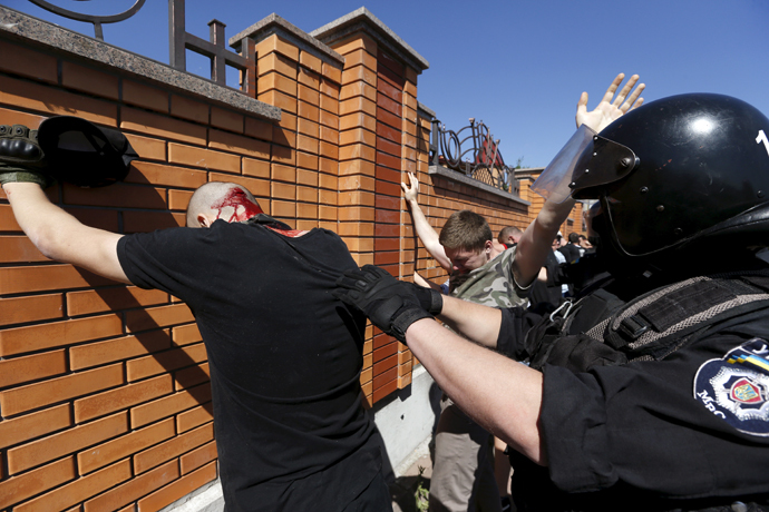 Interior Ministry members detain anti-gay protesters during the so-called Equality March, organized by a lesbian, gay, bisexual and transgender (LGBT) community, in Kiev, Ukraine, June 6, 2015. (Reuters / Stringer)