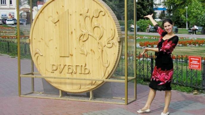 Rouble rebounds as commodities tide rises