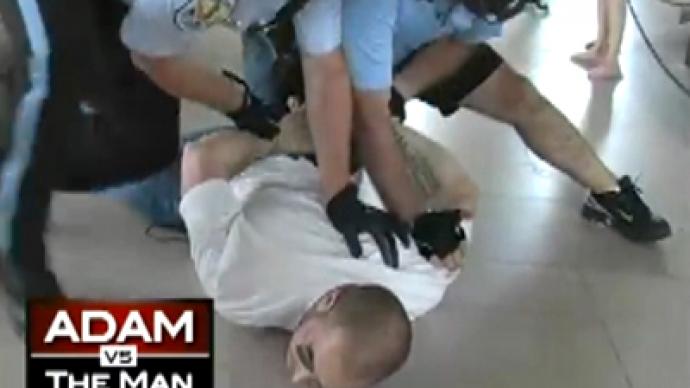RT presenter choked by police