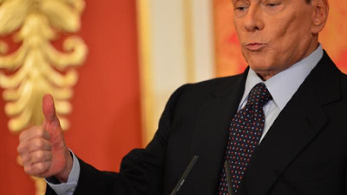 Berlusconi feels 'obliged' to stay in politics despite fraud conviction