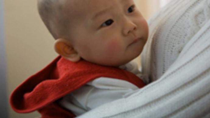 Childless couples rush to adopt quake orphans