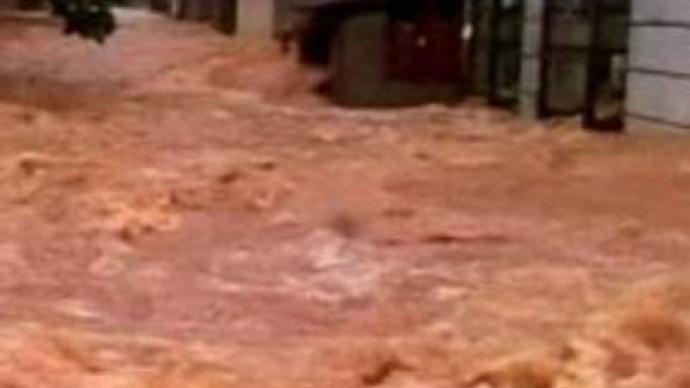 300,000 flee China storm