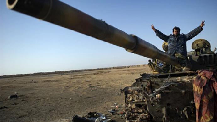Who is helping Gaddafi out?